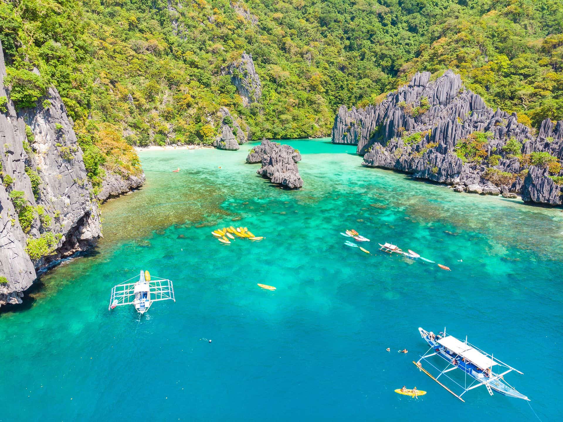 Ubugon Cove on paradise Cadlao island with sharp limestone rocks, tropical travel destination - El Nido, Palawan, Philippines