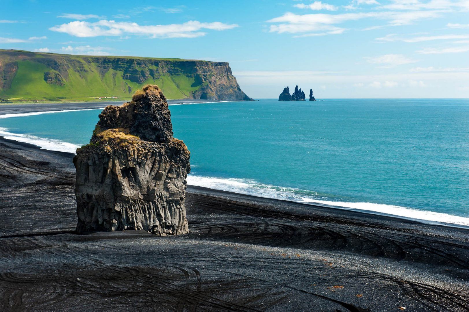 black-sand-volcanic-iceland-beach-Dyrholaey-shutterstock_139682365