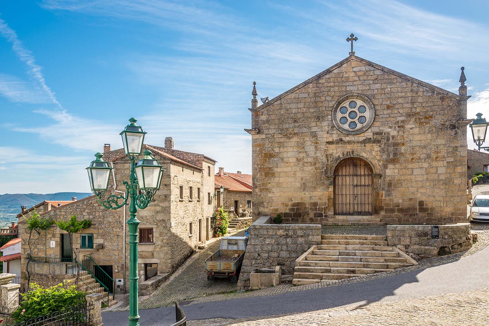 Church Matriz of Sao Salvador in the streets of Monsanto in Portugal © Shutterstock