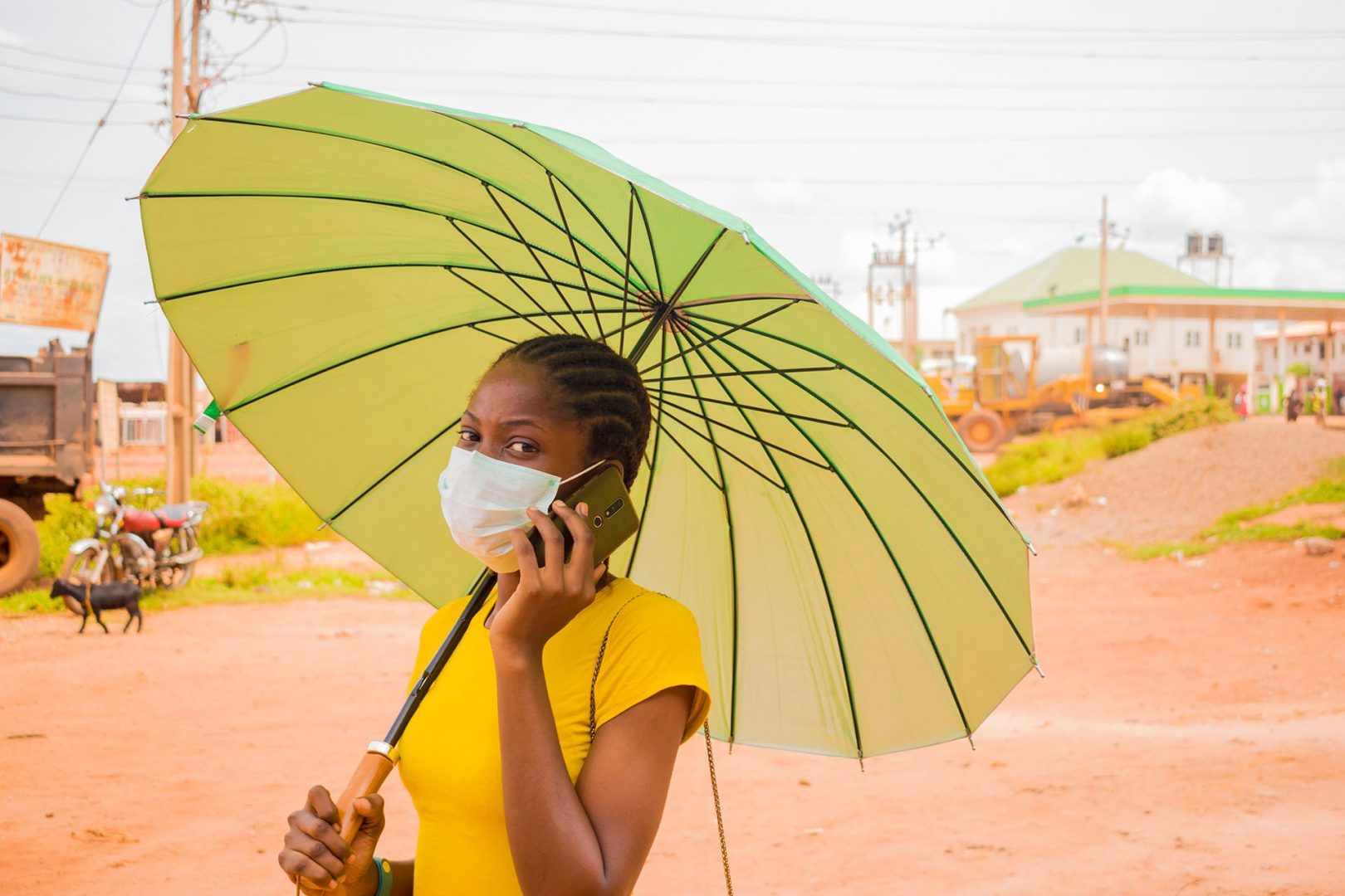 Nigerian lady wearing face mask prevent, prevented herself from the outbreak in her society
