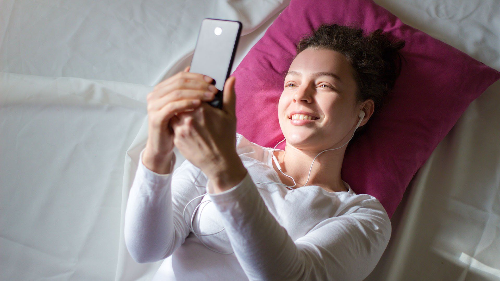 Video call in pandemic times, gesturing "Hi" to friend
