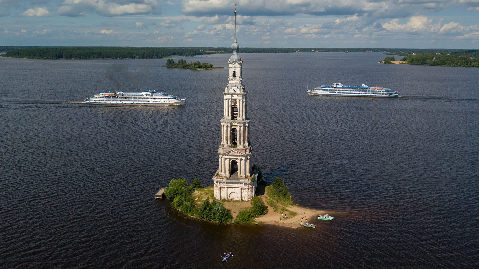 A ships float past the famous Kalyazin Bell Tower ©  Elena Ignatyeva/Shutterstock