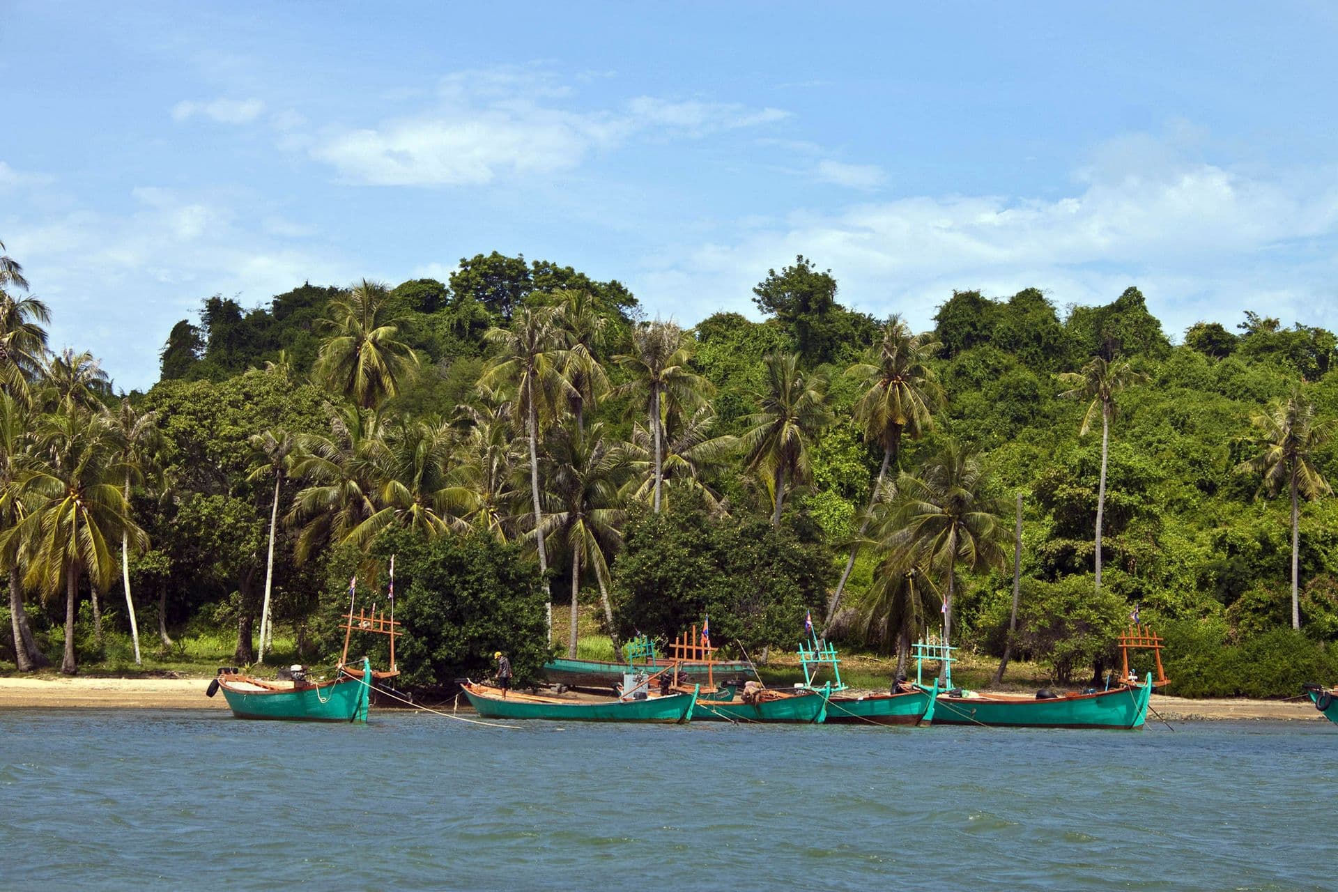 Tropical beach with boats on Koh Tonsay island, Cambodia