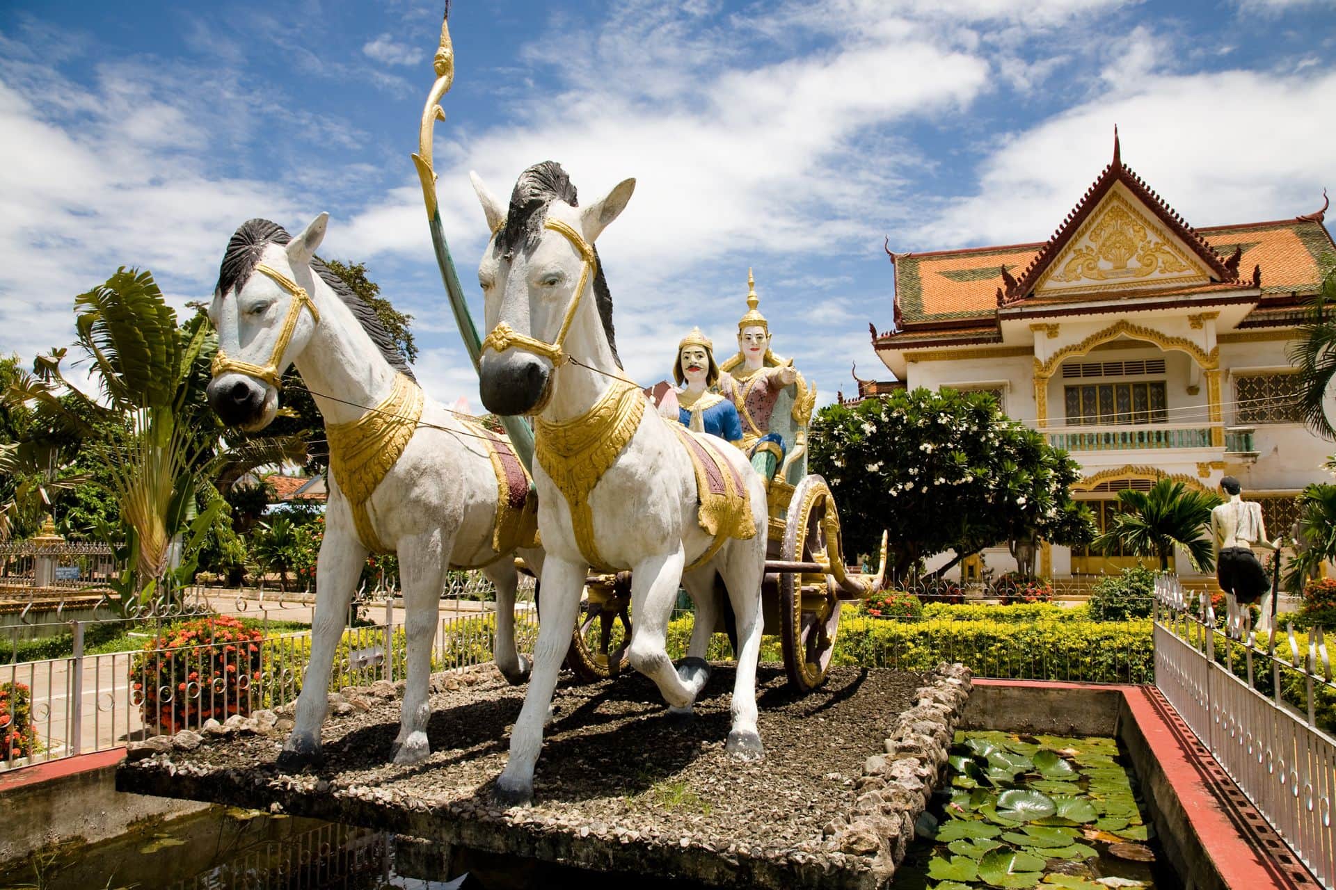 Statues in front of a Cambodian buddhist temple called Wat Kampheng in the city of Battambang