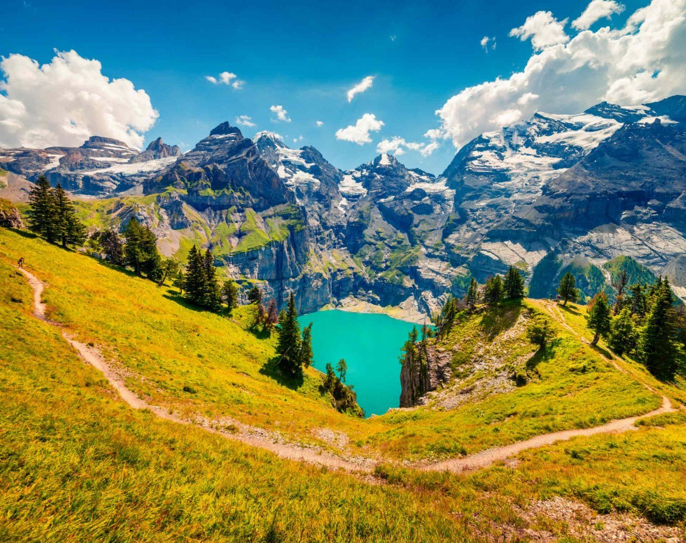 20 great places to pitch a tent: Oeschinensee lake, Bluemlisalp mountain, Alps, Switzerland.