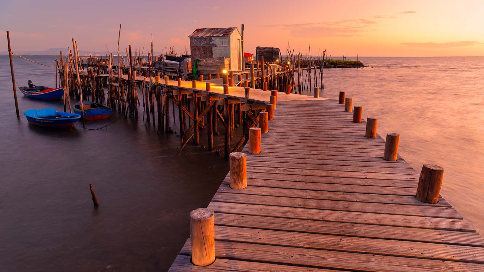 Amazing sunset on the palatial pier of Carrasqueira, Alentejo, Portugal © Shutterstock