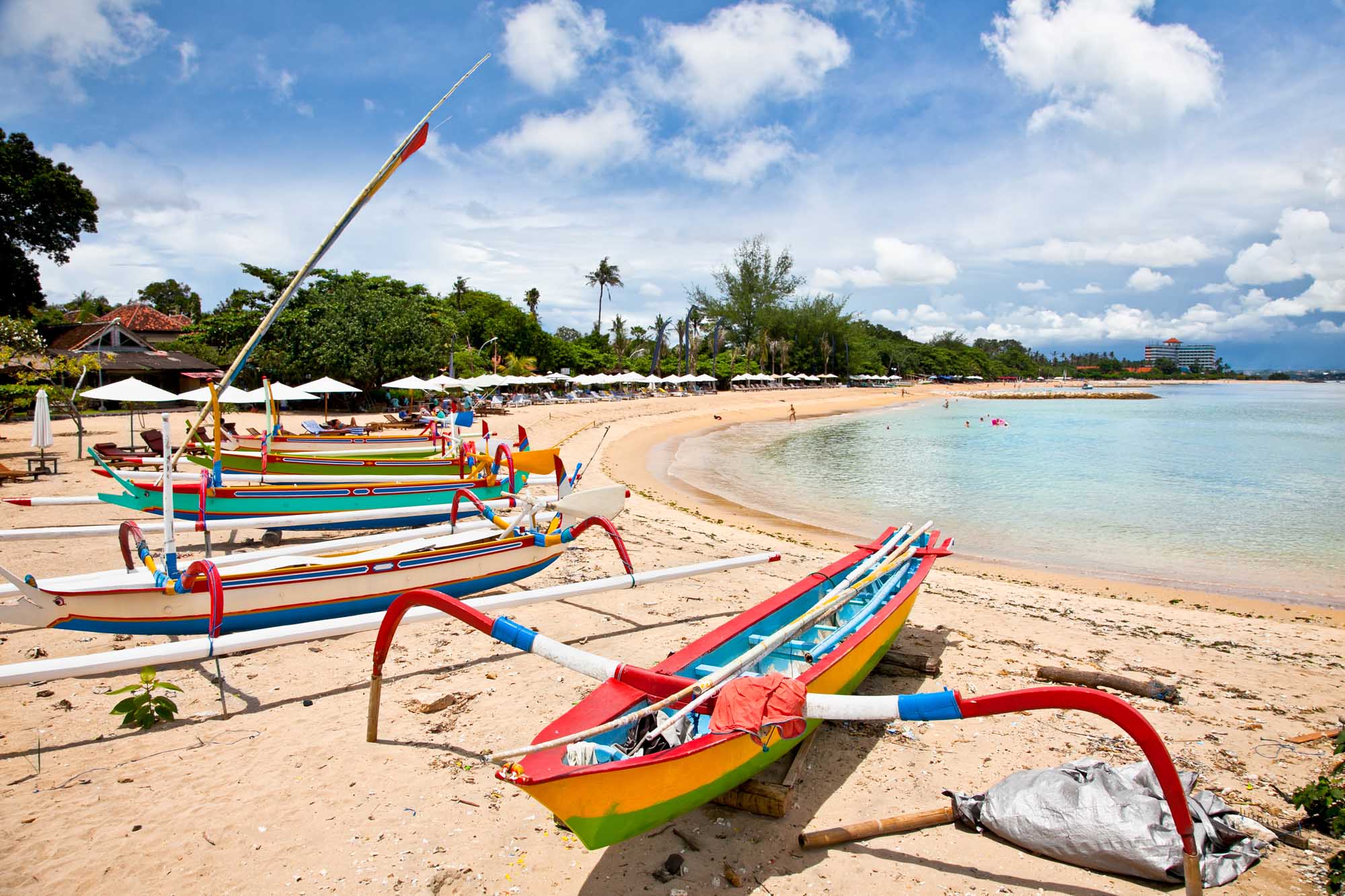 Traditional fishing boats on a beach in Sanur on Bali.