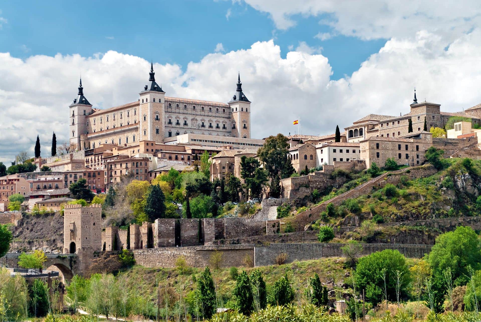 Old town of Toledo, with Alcazar on a hilltop.