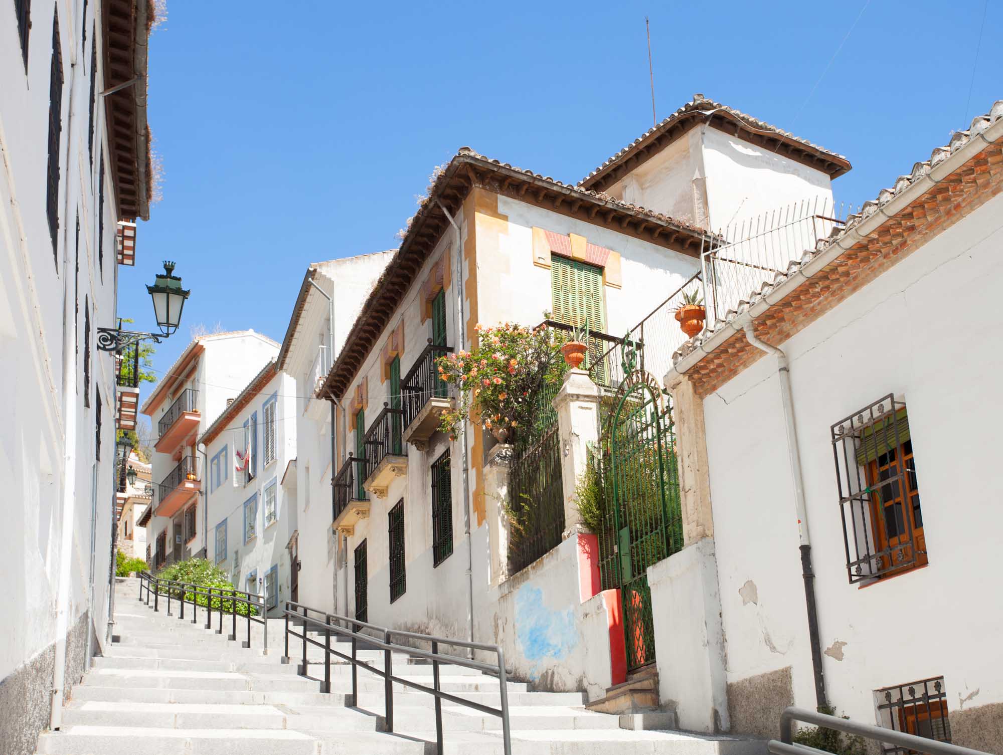 The narrow street with old houses, Granada