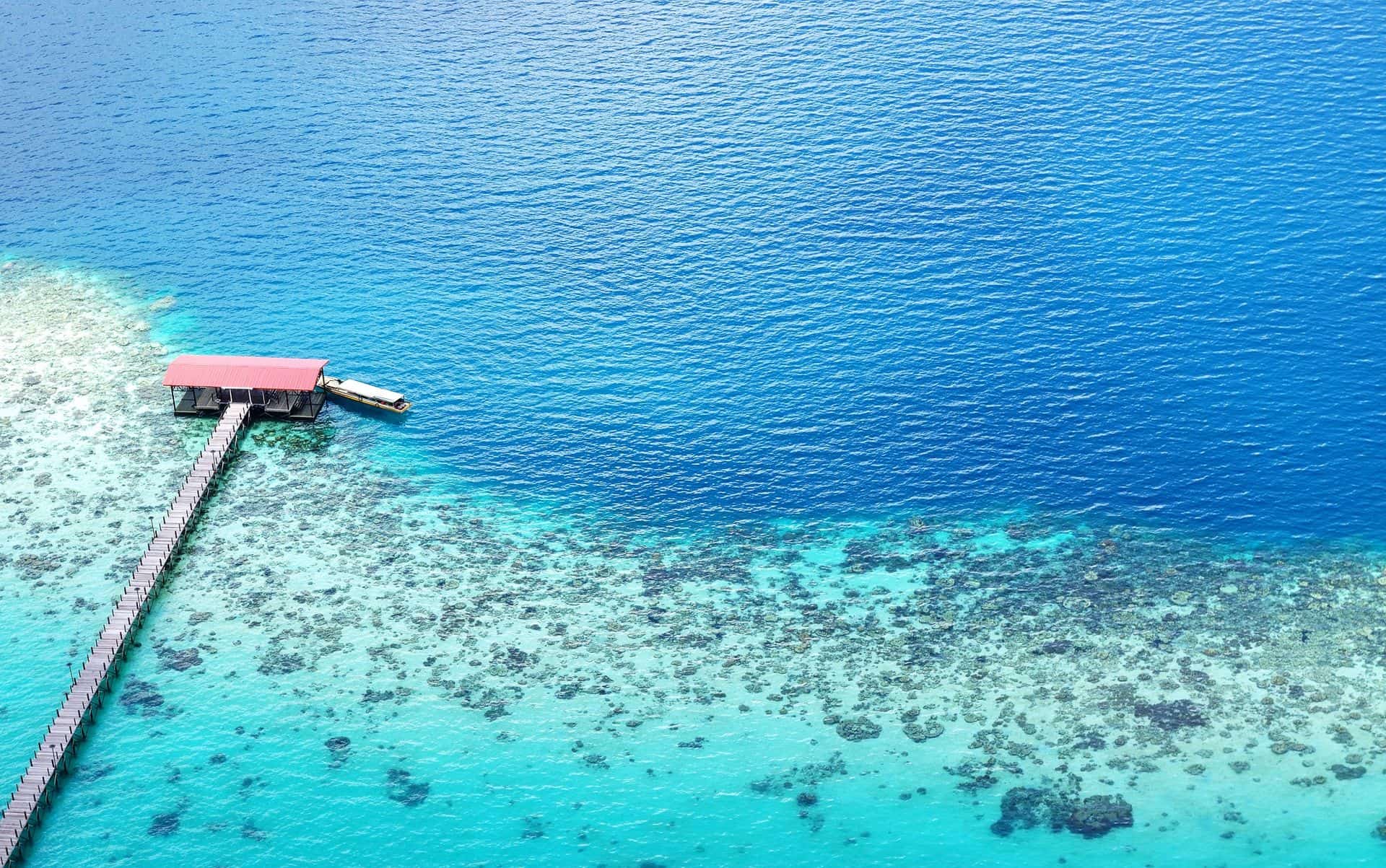 View of Turquoise Ocean and Jetty from the top of an, Borneo, Sabah Malaysia