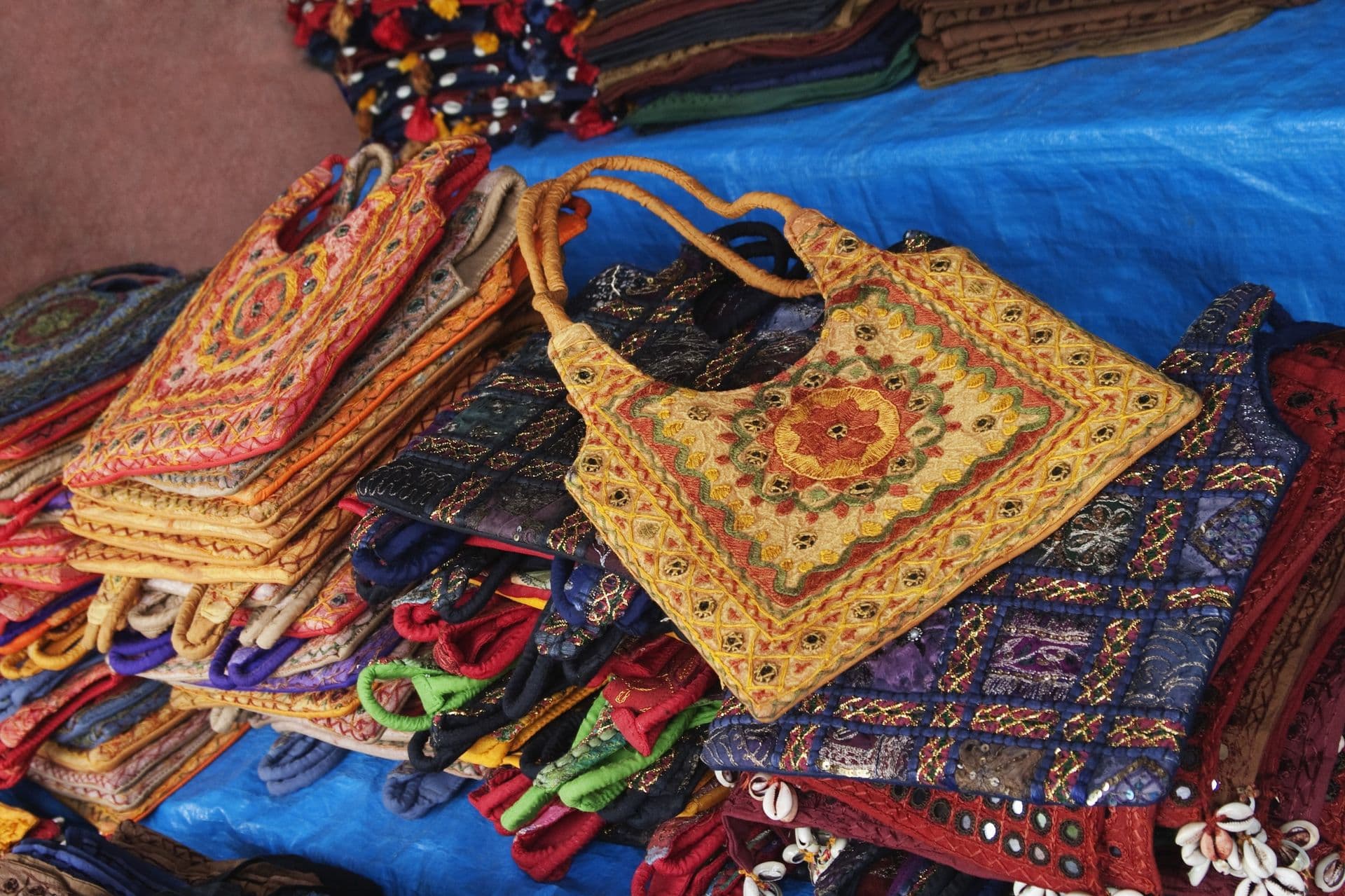 Close-up of bags for sale at a market stall, New Delhi, India