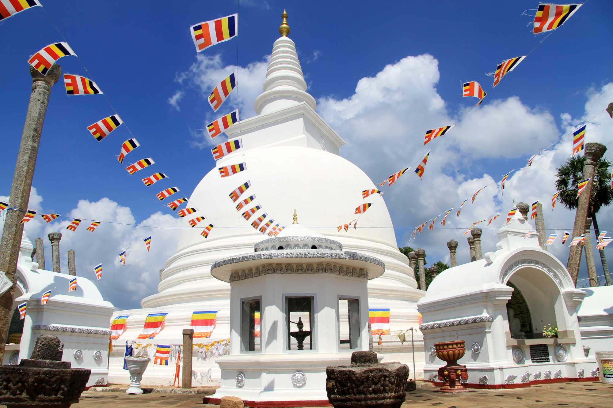 Thuparamaya dagoba with flags in Anuradhapura
