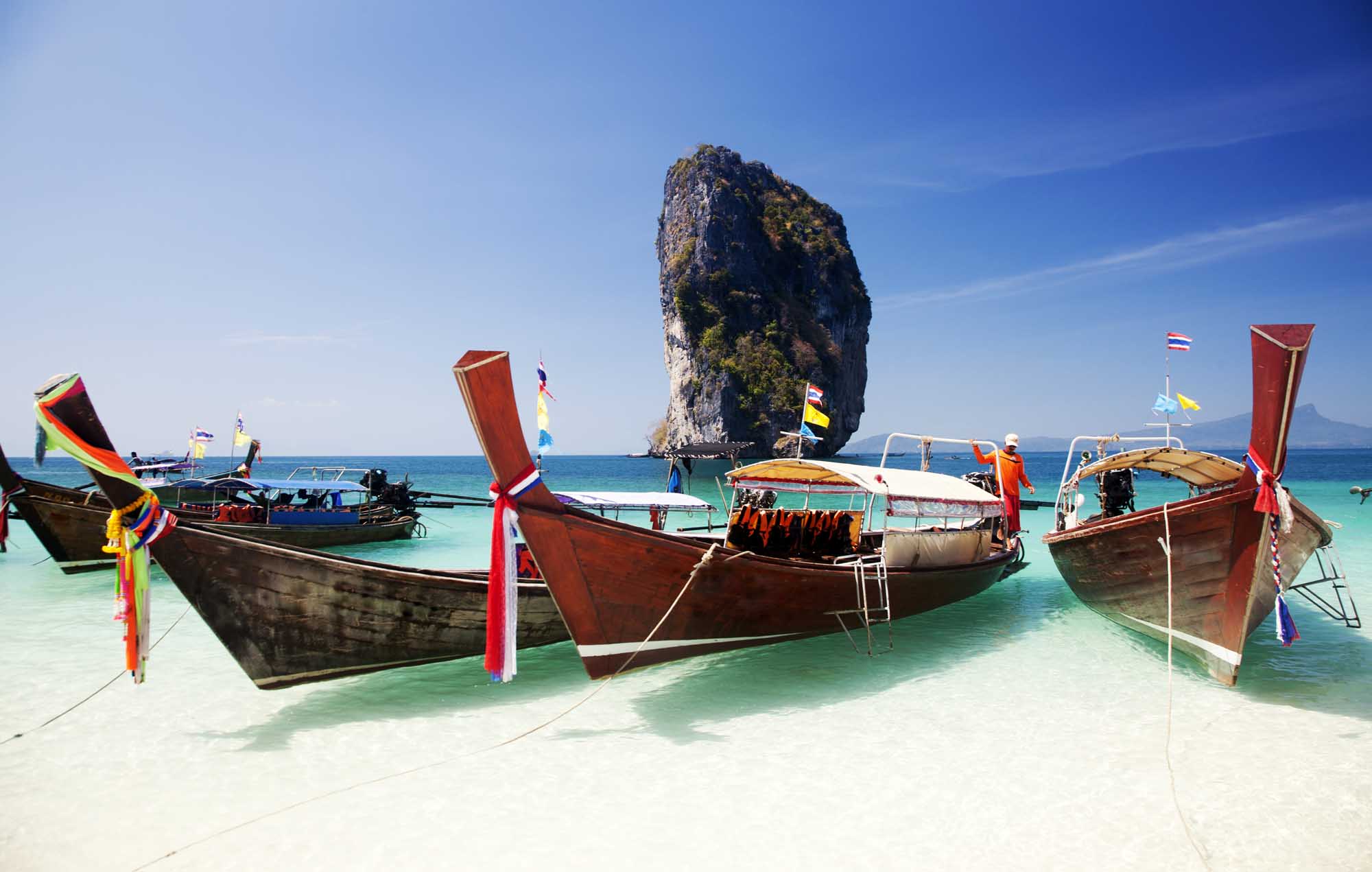 Exotic beach view and traditional ship on Ko Poda