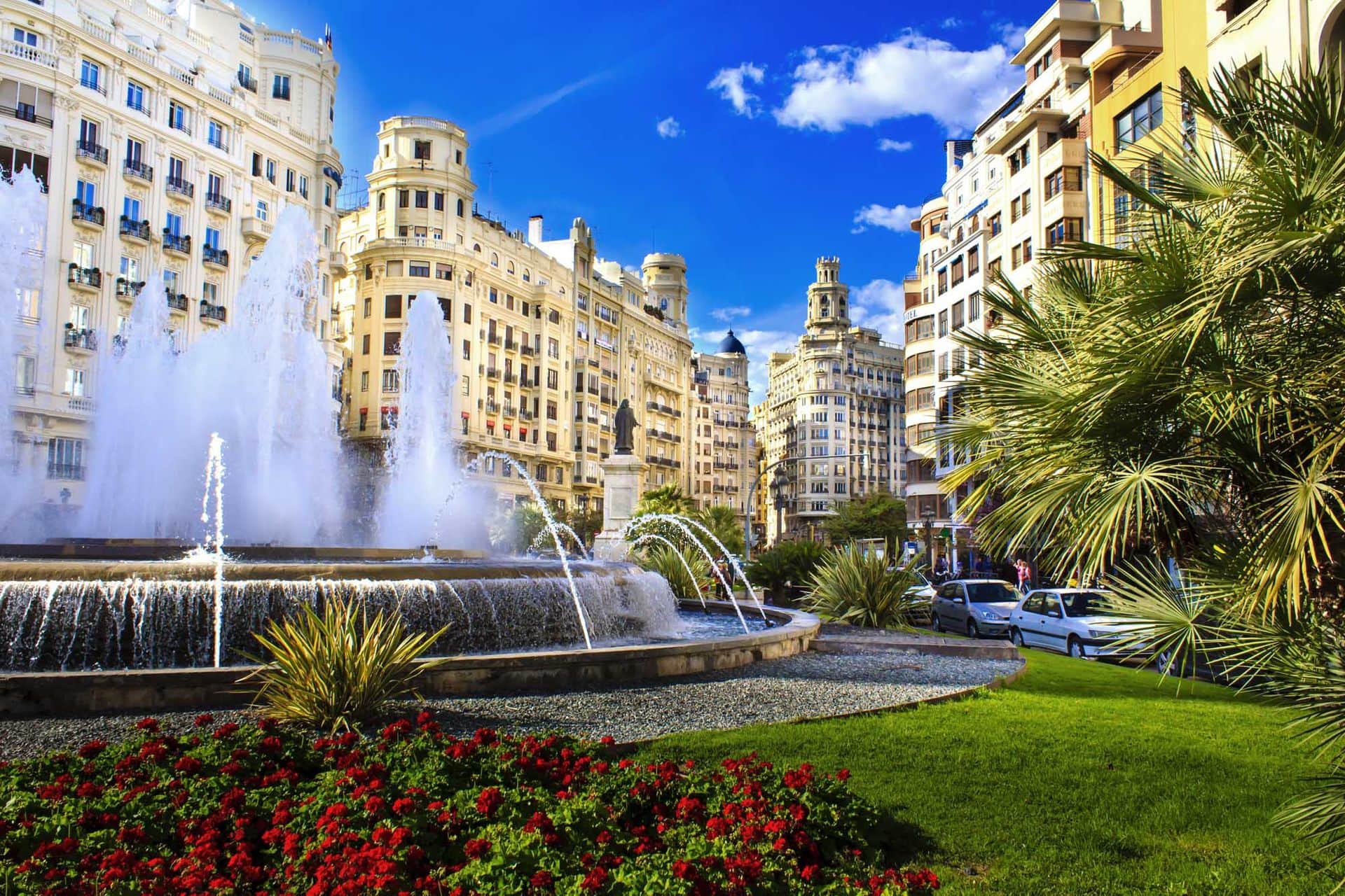 Main city square of Valencia, The Plaza del Ayuntamiento in bright afternoon colors, Spain