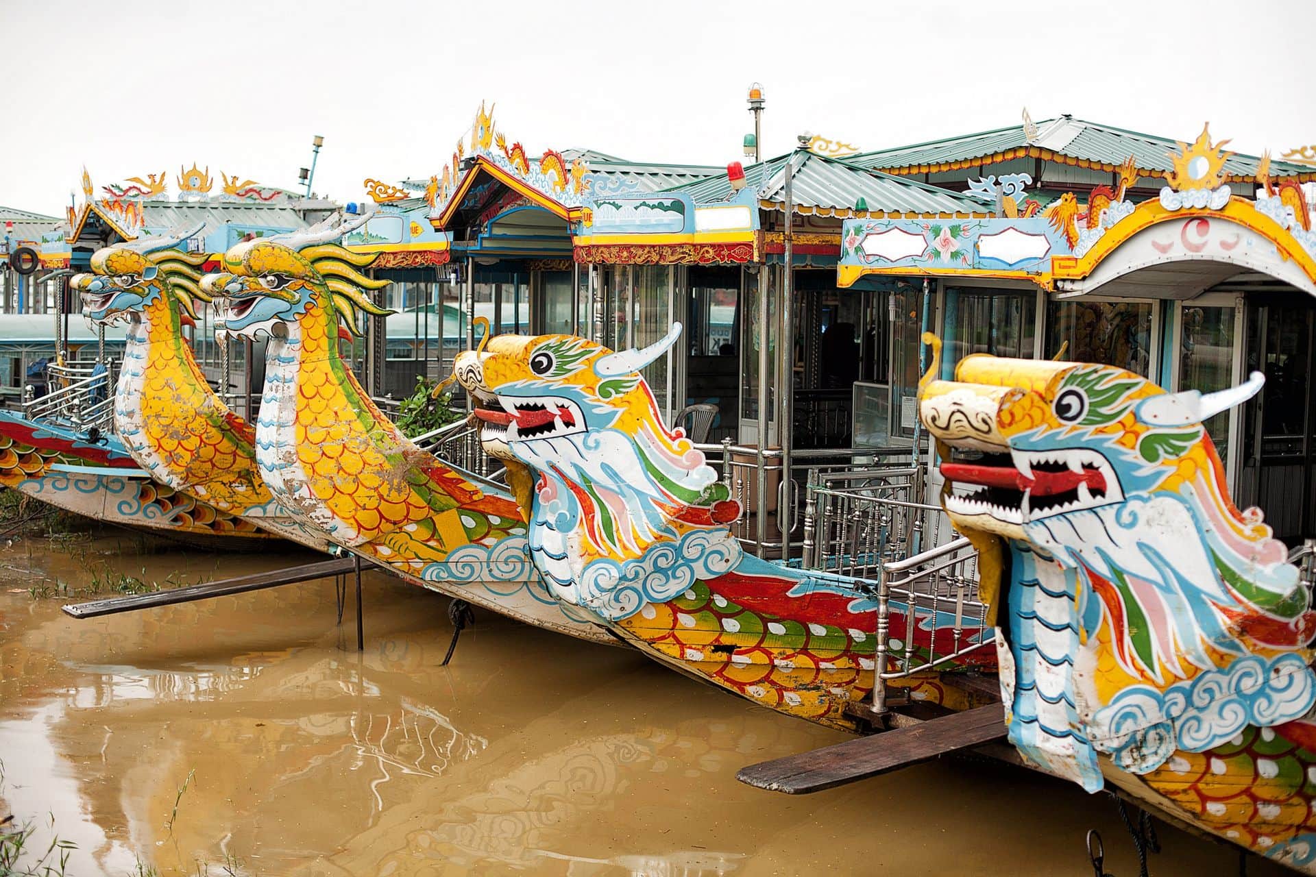 Very colourful River Boats moored on the Perfume River, Hue, Vietnam