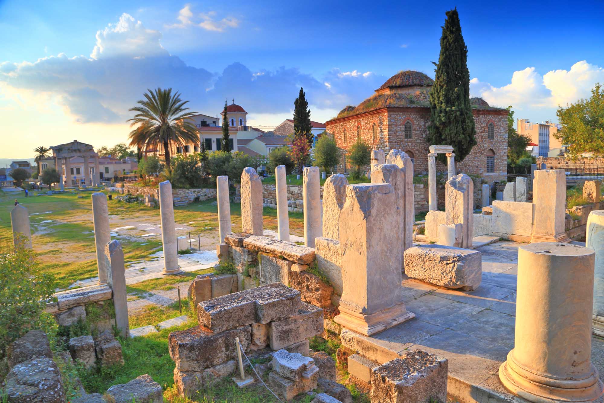 Roman Agora with ancient columns and ruins at sunset, Athens, Greece