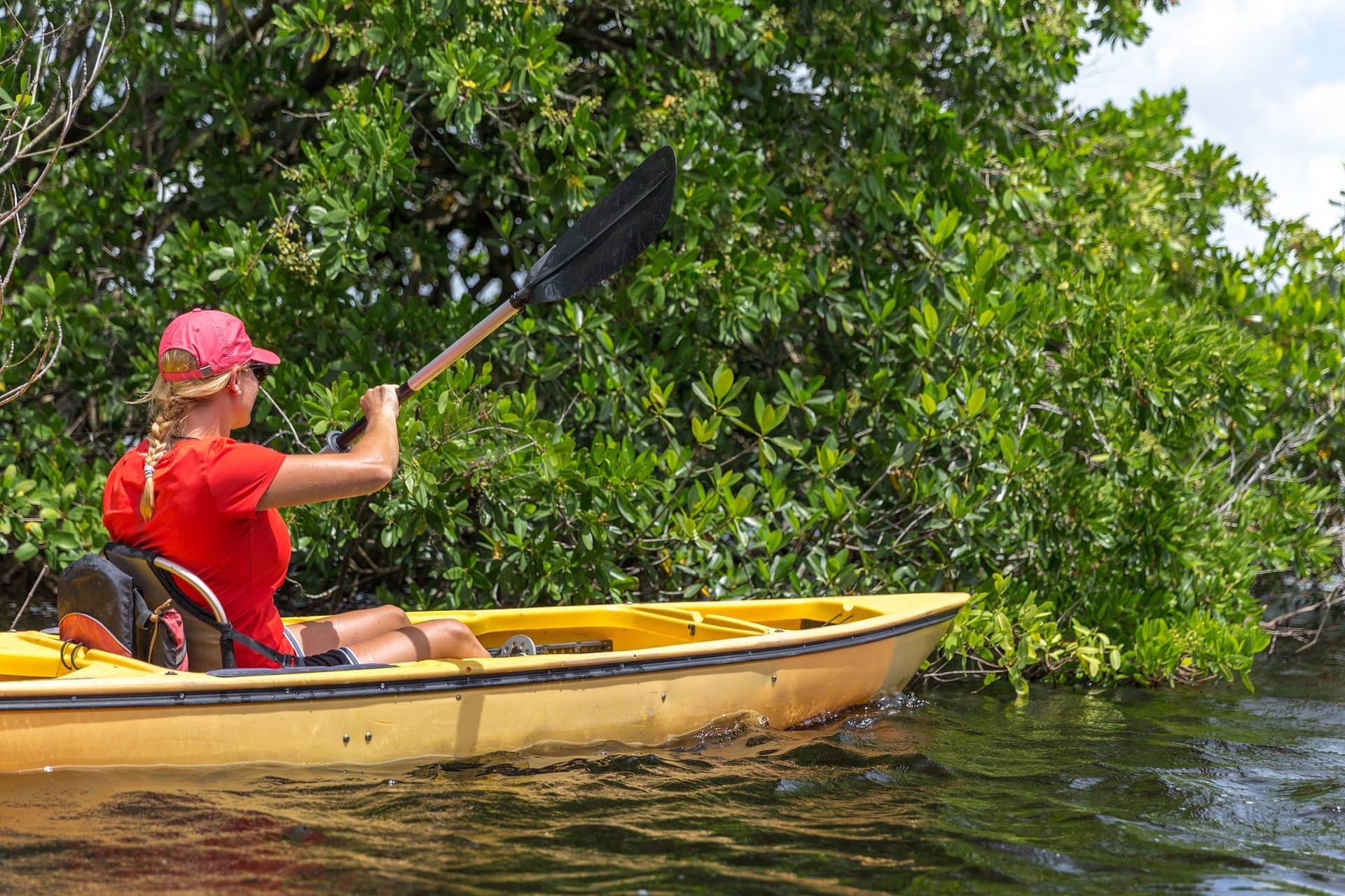 Young woman kayaking