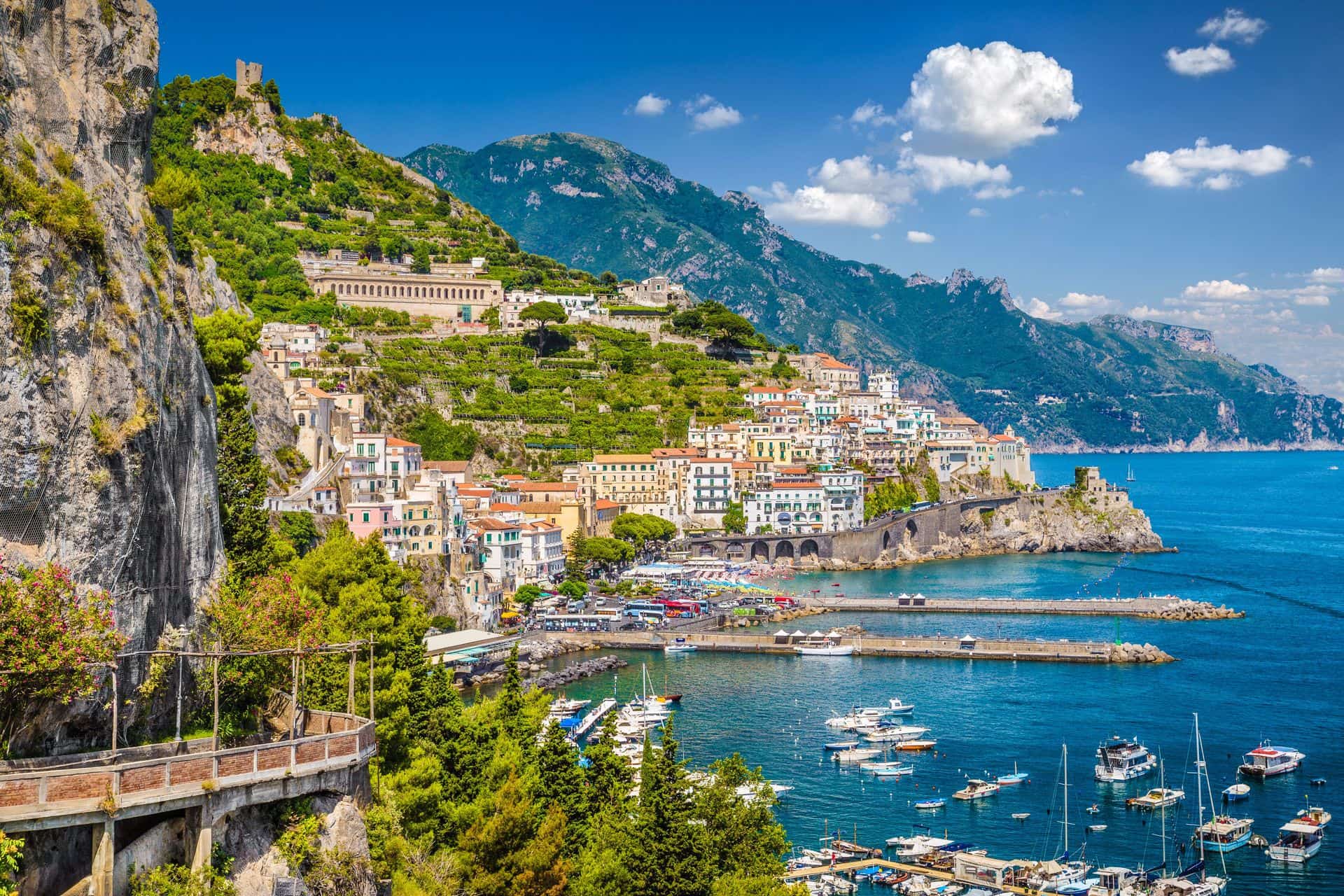Scenic picture-postcard view of the beautiful town of Amalfi at famous Amalfi Coast with Gulf of Salerno, Campania, Italy