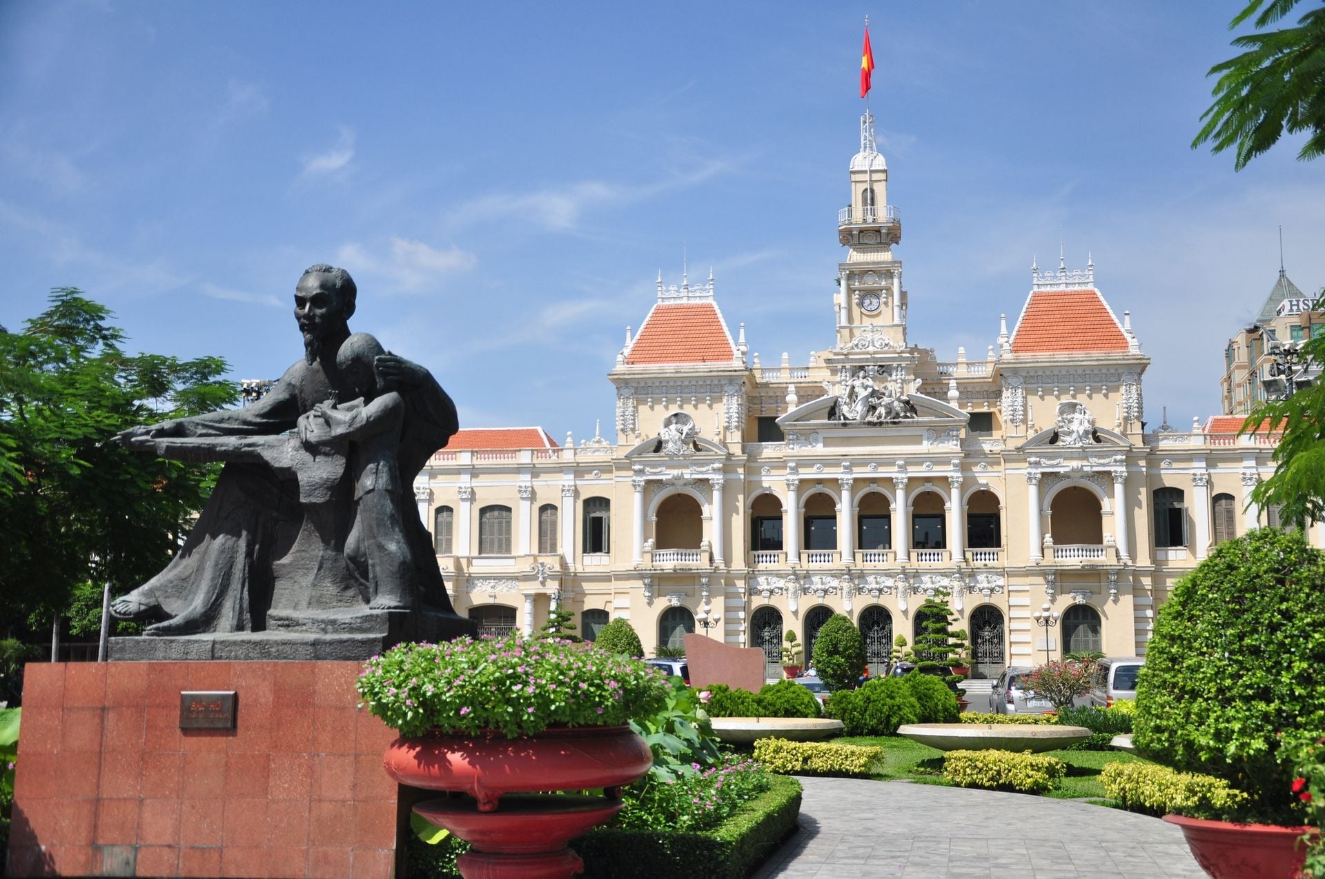 Statue of Ho Chi Minh and People's Committee Building in Ho Chi Minh City, Vietnam.