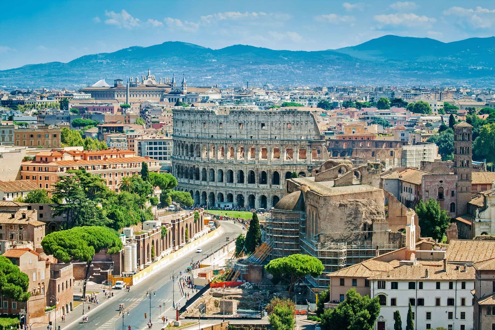 Aerial cityscape of Rome with Forums and Colosseum, Rome, Italy