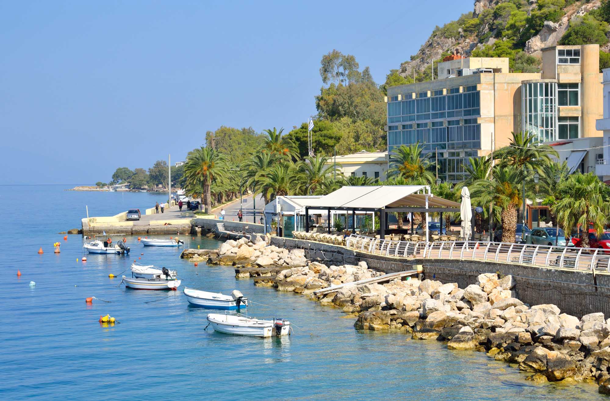 Embankment in Loutraki town at sunny summer day, Greece.