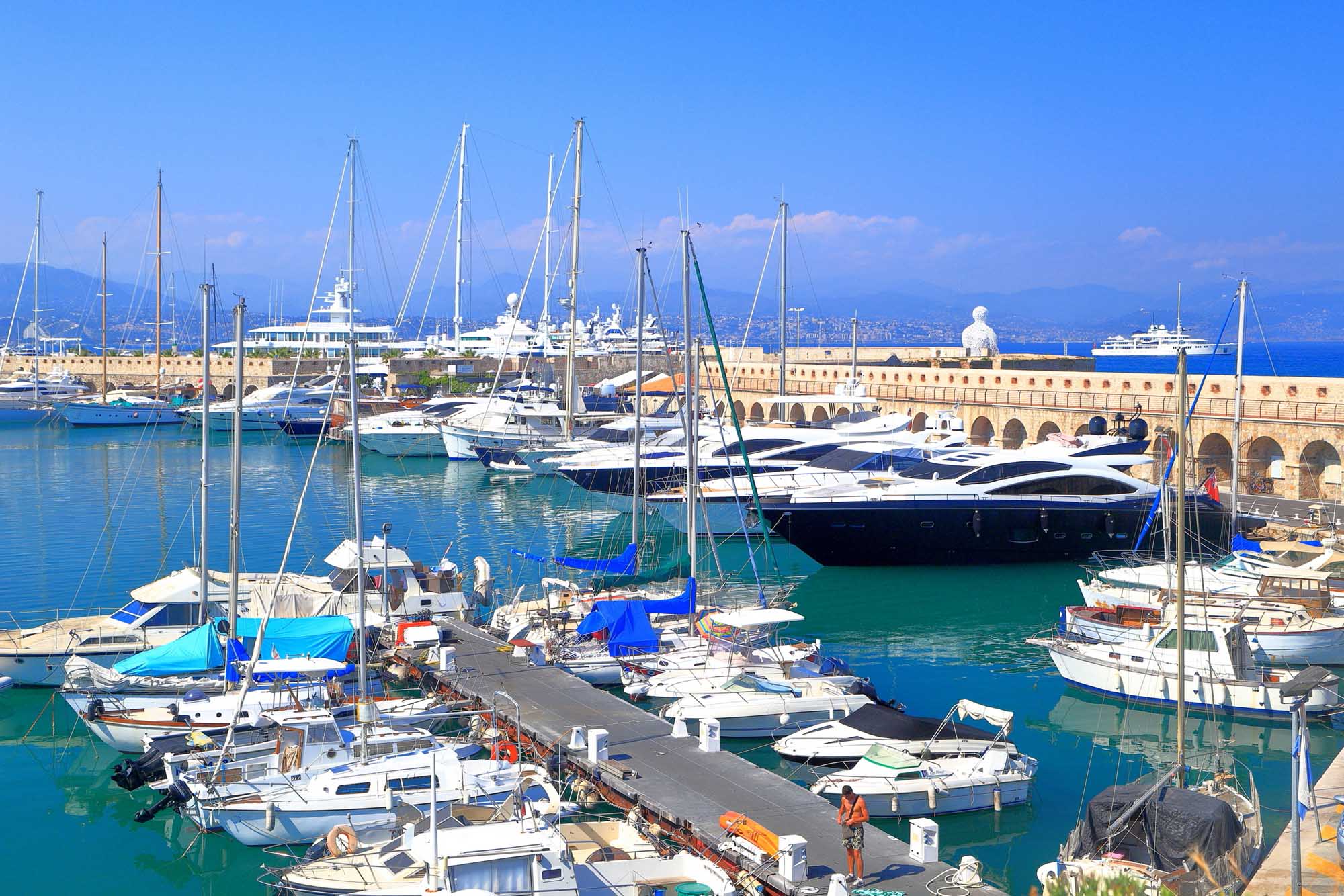 Leisure boats and yachts inside the harbor of Antibes, French Riviera, France