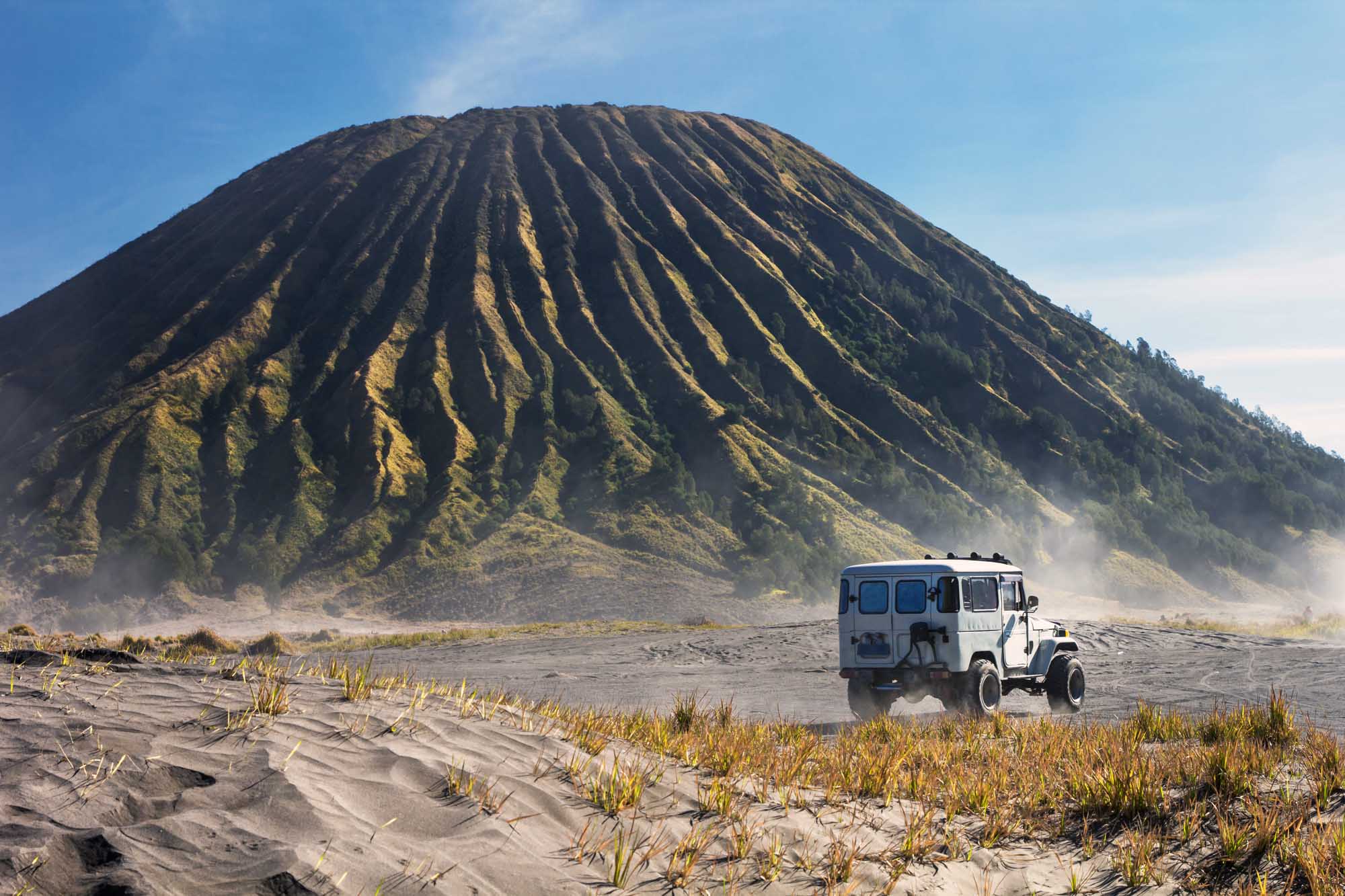 4x4 car service for tourist on desert at Bromo Mountain, Mount Bromo is one of the most visited tourist attractions in Java, Indonesia