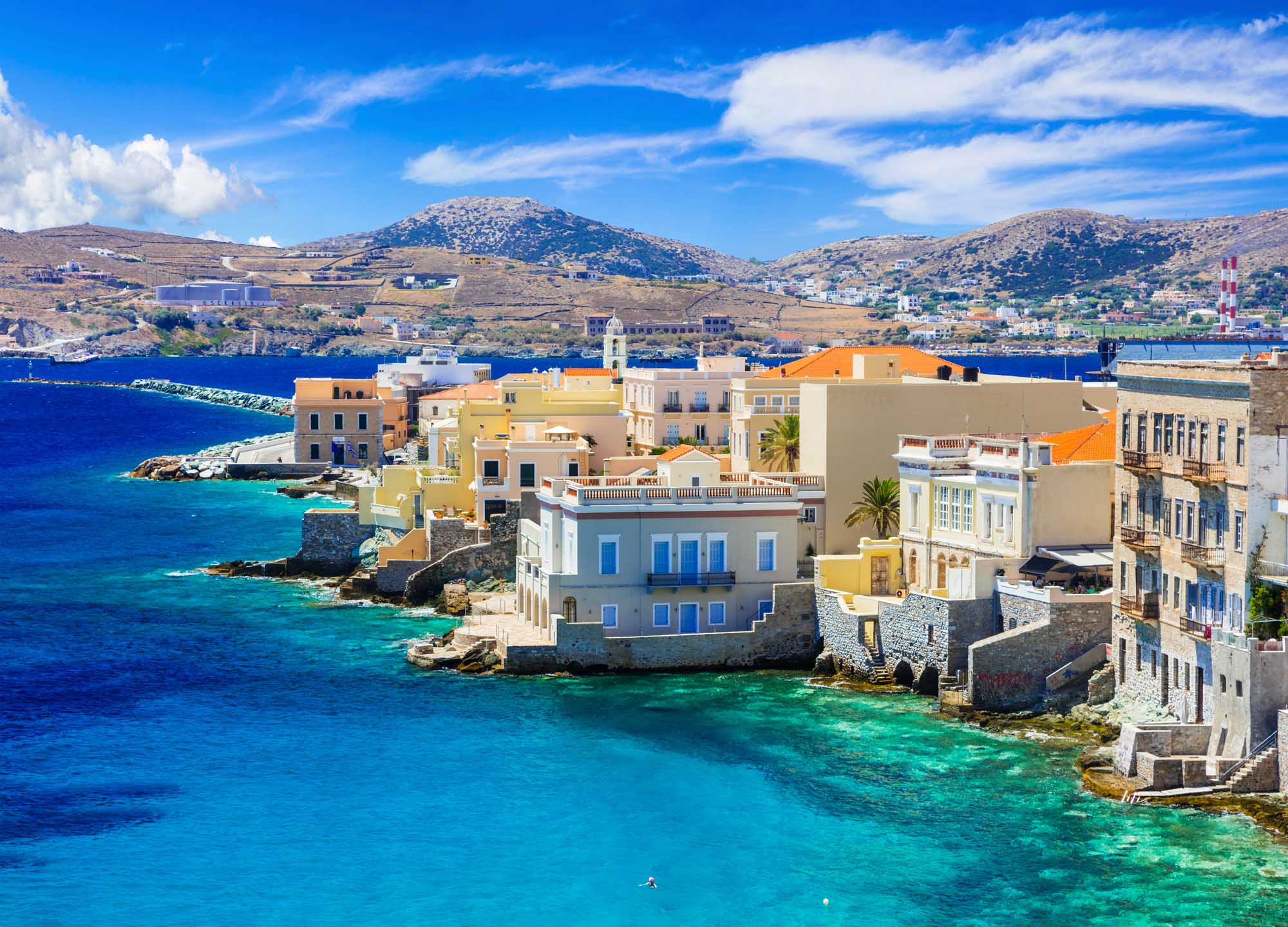 Picturesque island Syros - view of popular part "Little Venice"  syrosgreeceislandsirosaegeananoattractionbeautifulbluecapitalcitycruisecycladesermoupolieuropegreekholidaylandscapelittlememorymulticoloredmunicipalityorthodoxpanoramapanoramicpictorialpicturesquepopularportresortsceneryscenicseashipskysummersunnytourtourismtouristtouristictowntravelturquoisevacationveniceviewvillagevividShow more