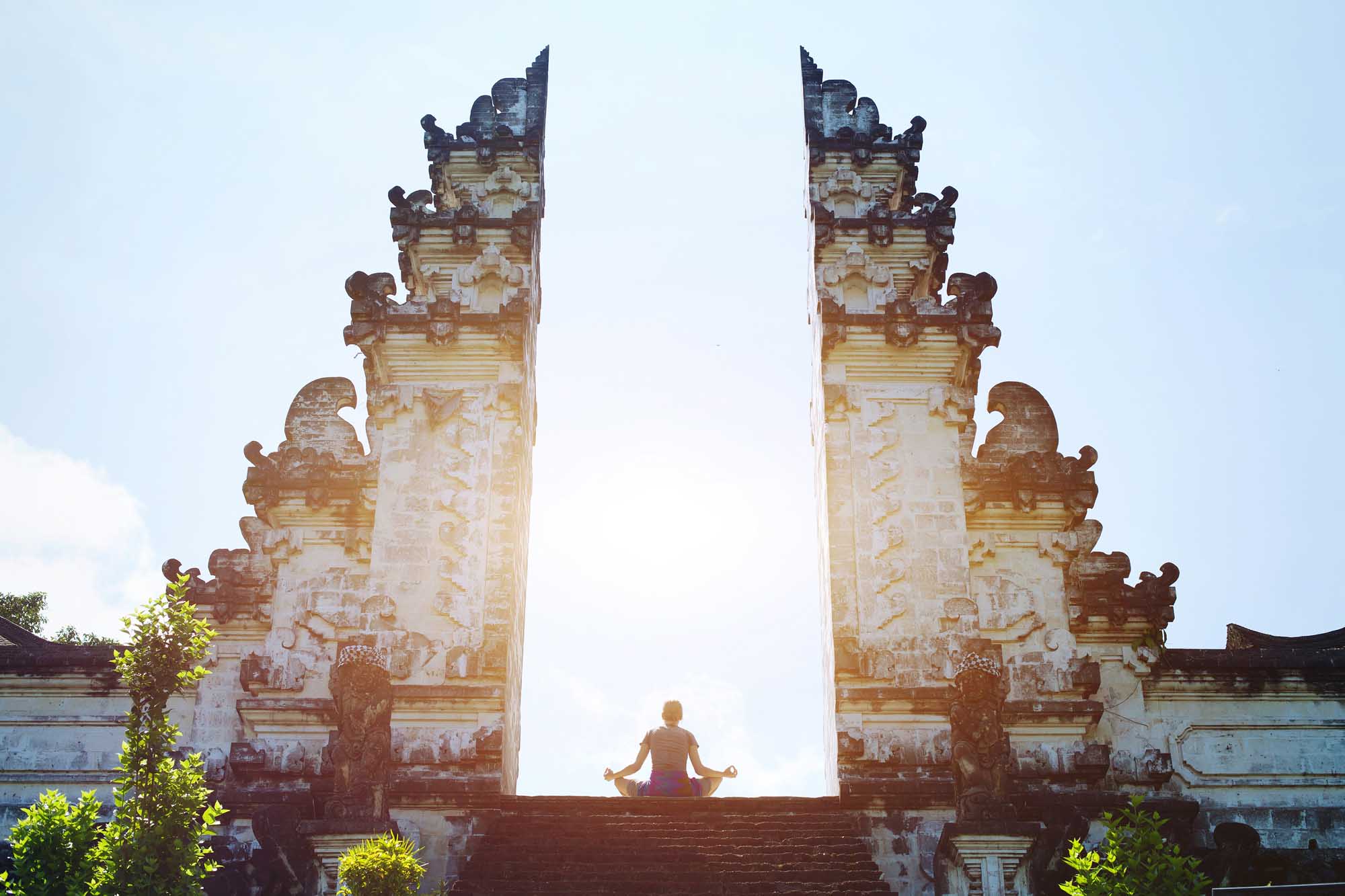Yoga in Bali, meditation in the temple, spirituality and enlightenment