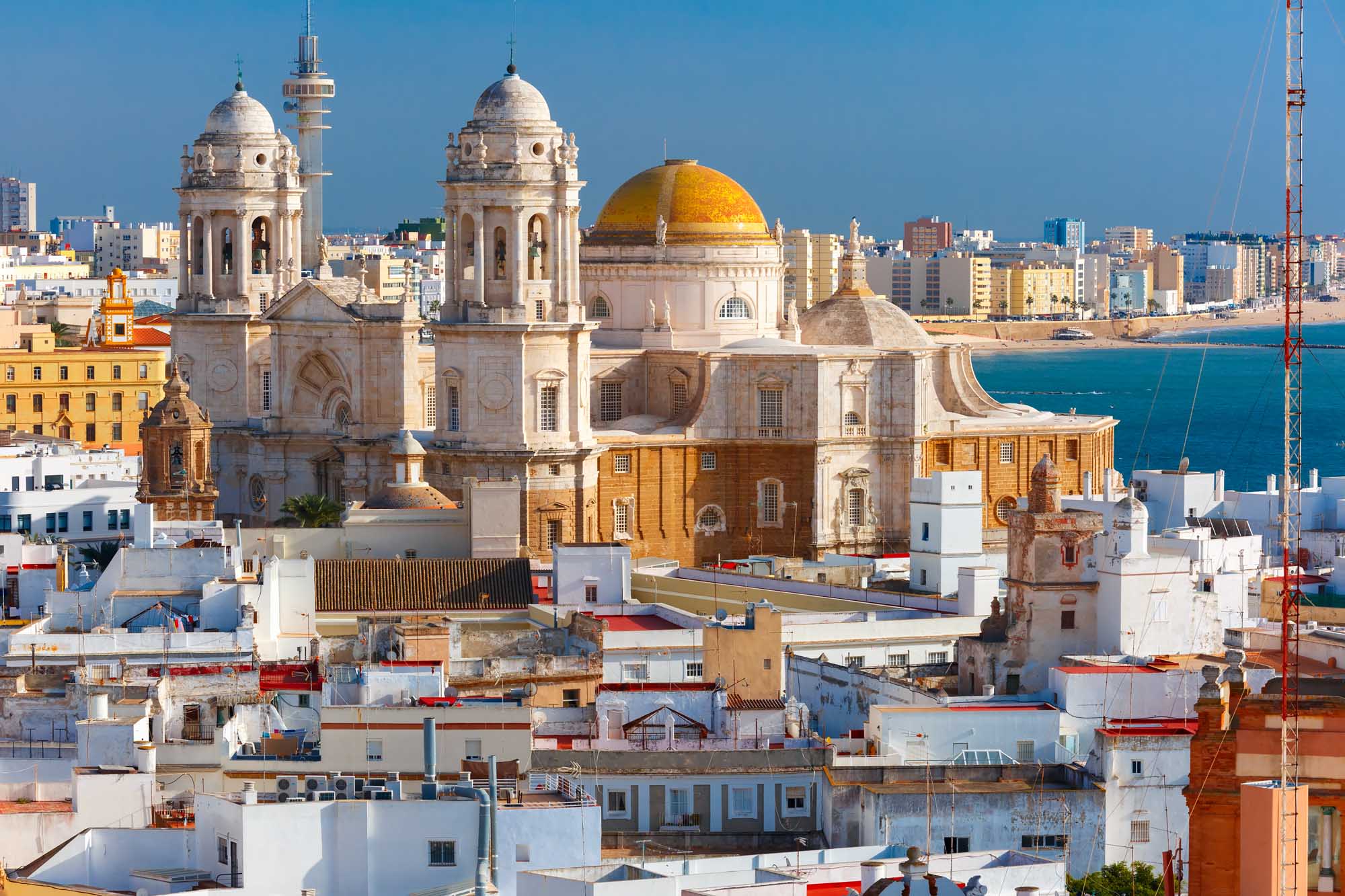 Aerial view of the old city rooftops and Cathedral de Santa Cruz in the morning from tower Tavira in Cadiz