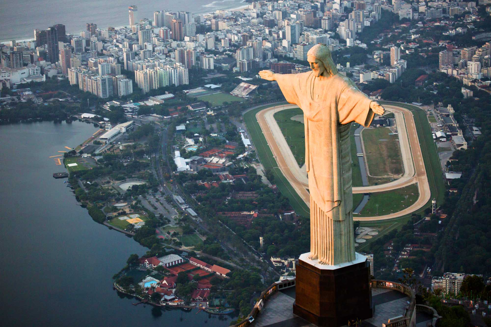 Aerial view of rio de janeiro with the christ redeemer with the city at background.