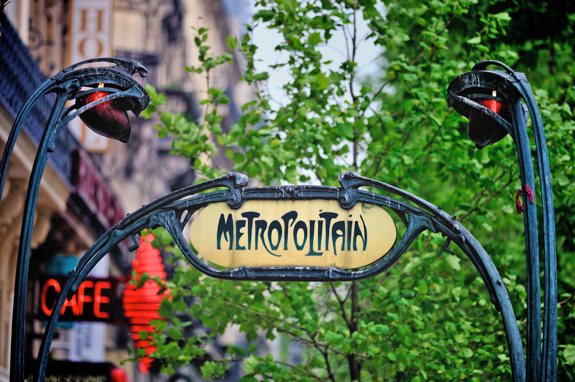 Signboard by entrance in subway. Paris. France