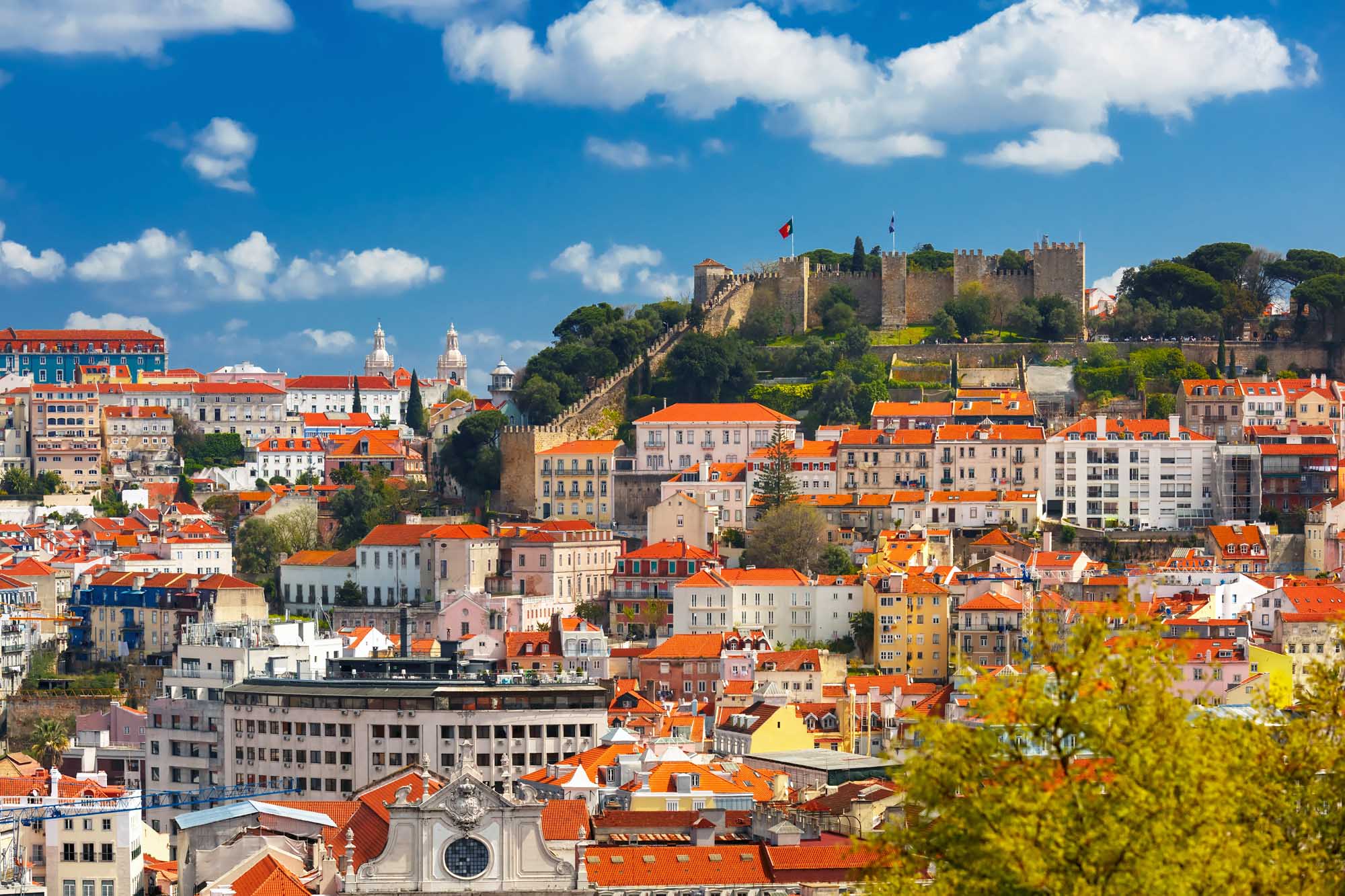 Aerial view of Castle of Saint George or Sao Jorge and the historical centre of Lisbon on the sunny afternoon, Lisbon, Portugal