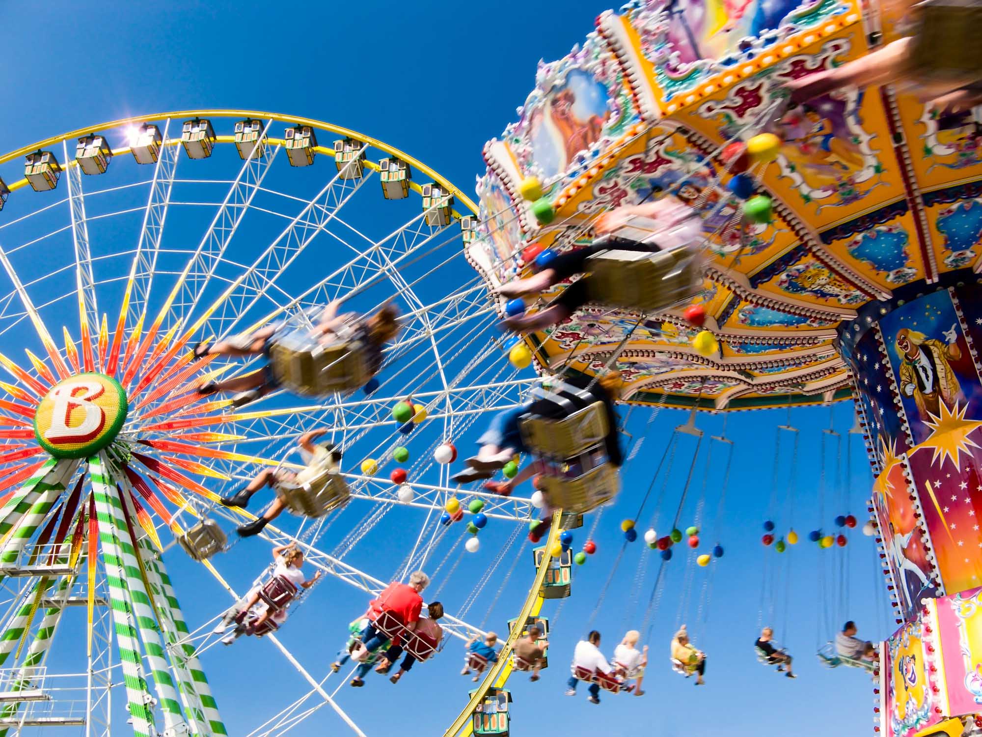 Vintage merry-go-round and ferris wheel
