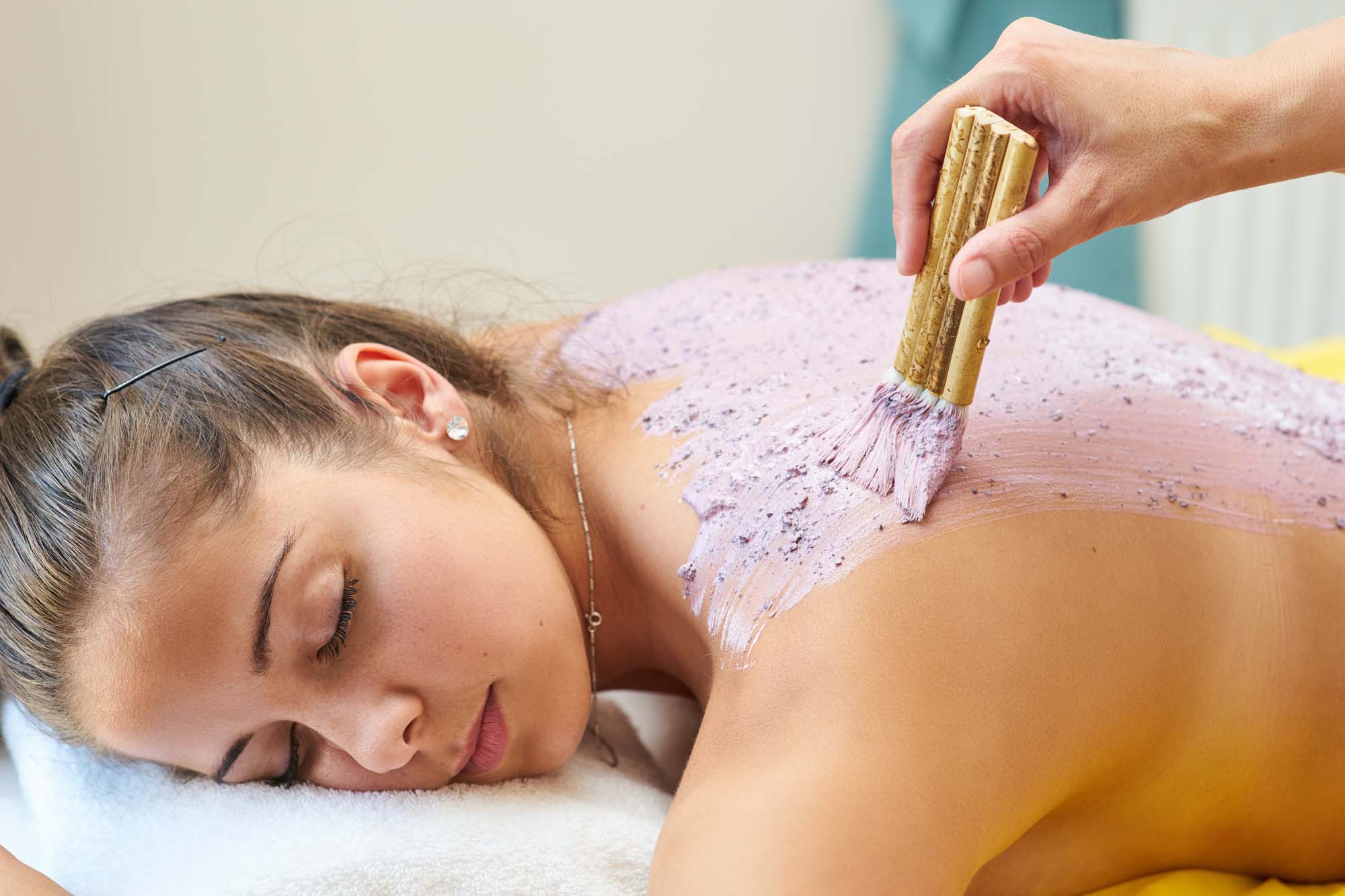 grape-massage therapy in a spa