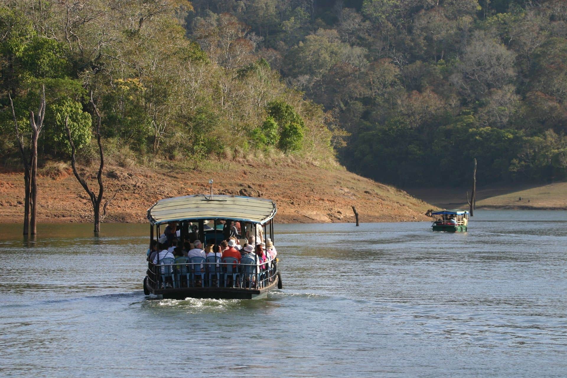 Boats on forest lake, Periyar National Park, Kerala, India