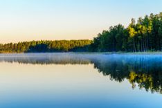 sunrise-lake-haukivesi-finland-shutterstock_643991395