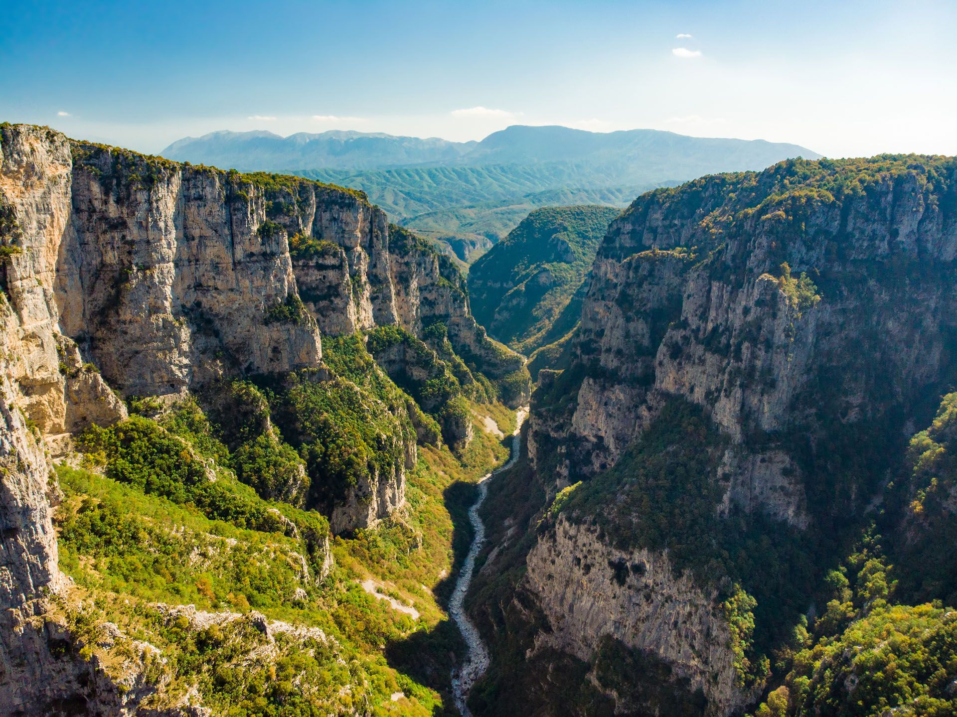 Aerial view of Vikos Gorge, a gorge in the Pindus Mountains of northern Greece, lying on the southern slopes of Mount Tymfi, one of the deepest gorges in the world. Zagori region, Greece © Shutterstock